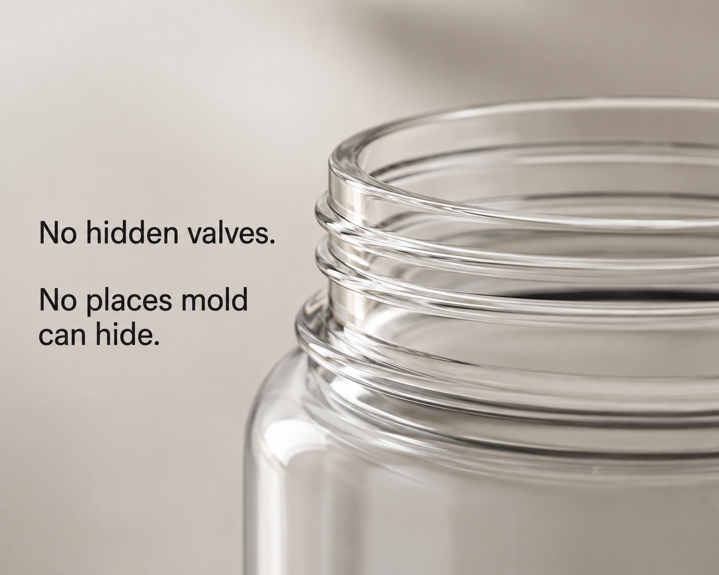 Close-up of the threaded glass neck — no hidden valves, no places mold can hide